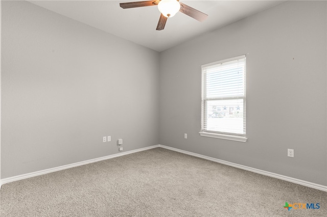 152 Navarro Xing Unit 3B, Seguin, TX 78155 - unfurnished room featuring a ceiling fan and carpet flooring