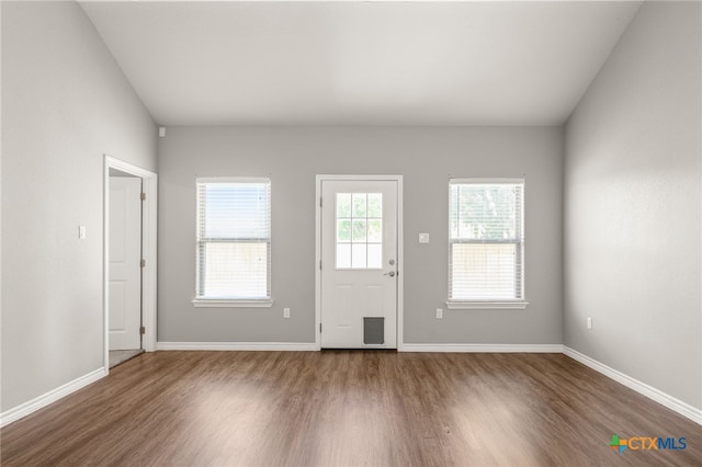 152 Navarro Xing Unit 3B, Seguin, TX 78155 - entryway featuring wood finished floors and baseboards