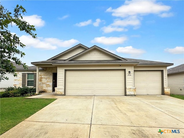 1938 Reserve Way, New Braunfels, TX 78130 - single story home with concrete driveway, stone siding, an attached garage, and a front lawn
