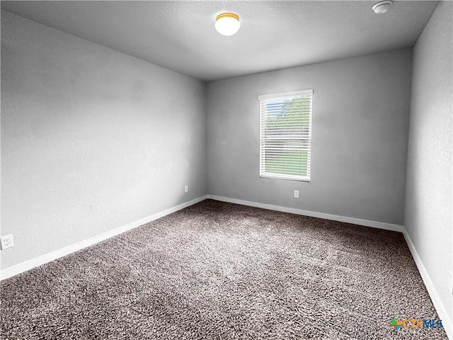 1938 Reserve Way, New Braunfels, TX 78130 - spare room with carpet floors, baseboards, and a smoke detector