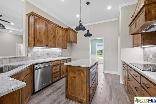 kitchen with black electric stovetop, light stone countertops, hanging light fixtures, light hardwood / wood-style floors, and stainless steel dishwasher