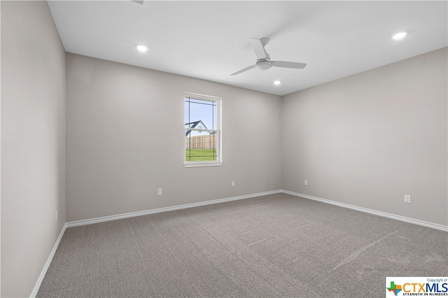 unfurnished room featuring carpet and ceiling fan