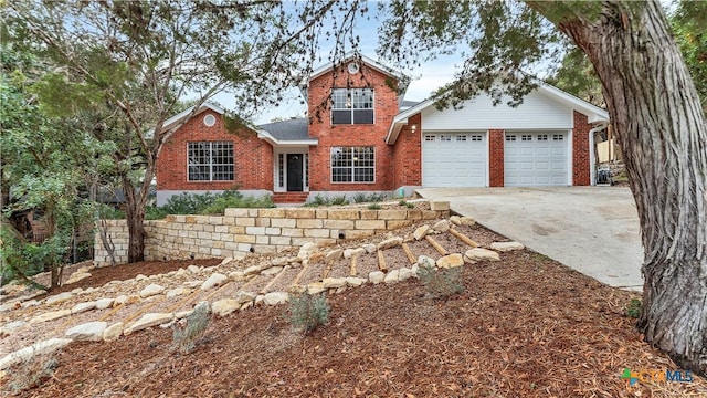 view of front of property featuring a garage