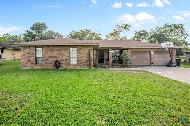 single story home with an attached garage, concrete driveway, a front lawn, and brick siding