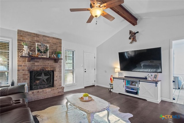 living room featuring ceiling fan, lofted ceiling with beams, a fireplace, baseboards, and wood finished floors