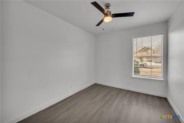 unfurnished room with ceiling fan and hardwood / wood-style floors