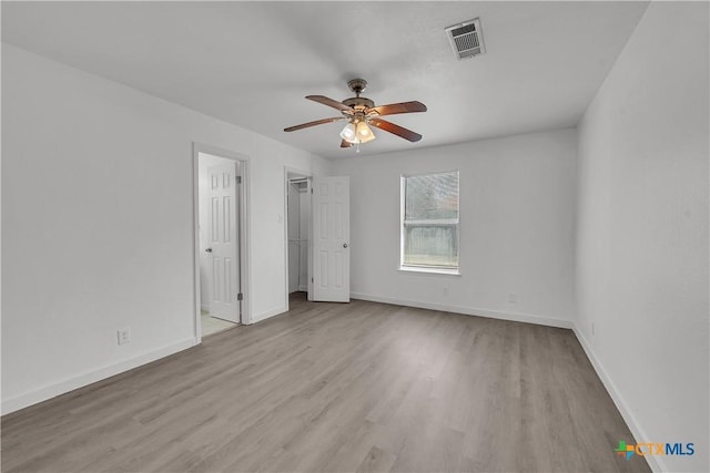 unfurnished bedroom featuring ceiling fan and light hardwood / wood-style flooring