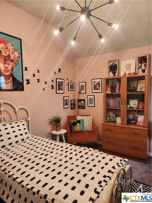 carpeted bedroom featuring lofted ceiling