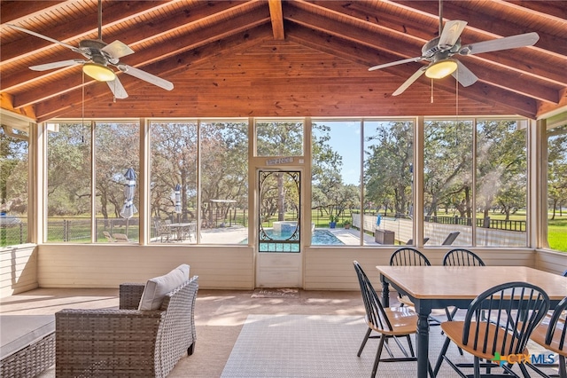 sunroom / solarium with a ceiling fan, wood ceiling, and lofted ceiling with beams