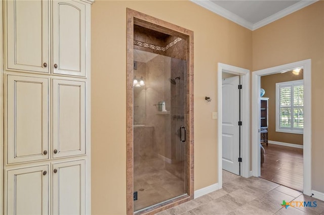 55 Post Oak Bnd, Inez, TX 77968 - full bathroom featuring a shower stall, baseboards, ornamental molding, and tile patterned flooring