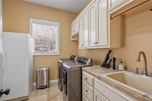 55 Post Oak Bnd, Inez, TX 77968 - laundry room with independent washer and dryer, cabinet space, and baseboards