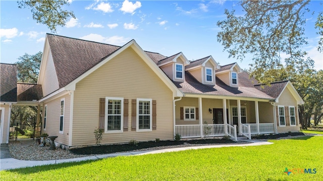 cape cod house featuring a porch, a front lawn, and a shingled roof