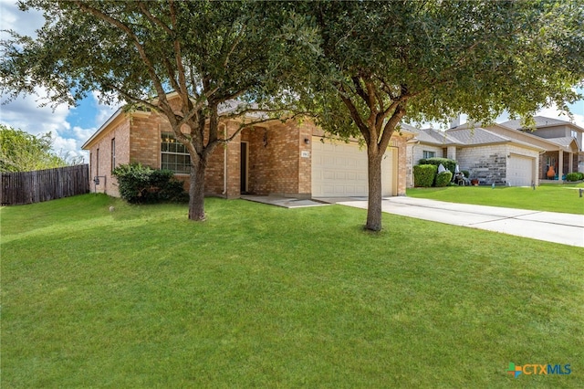 ranch-style home featuring driveway, a front lawn, fence, a garage, and brick siding