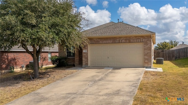 ranch-style home with brick siding, driveway, a garage, roof with shingles, and central AC unit