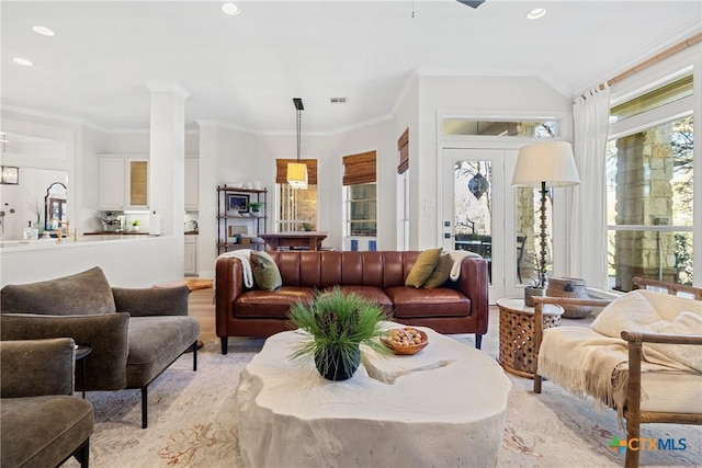 living room with crown molding