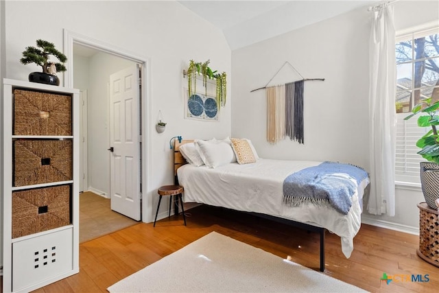 bedroom featuring hardwood / wood-style flooring