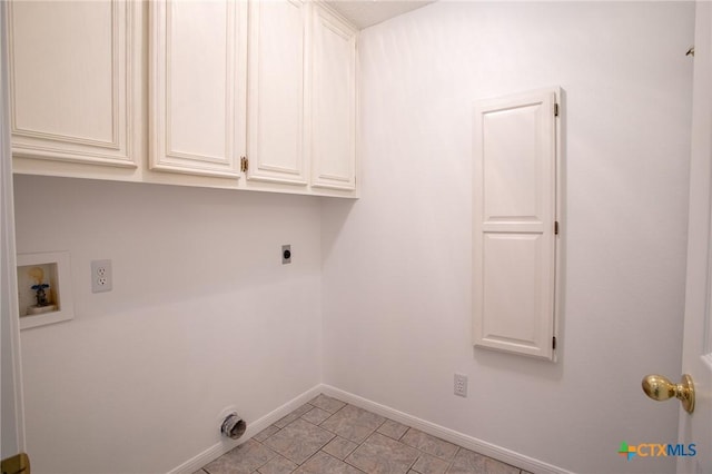 113 Ashford Dr, Victoria, TX 77904 - laundry room featuring electric dryer hookup, cabinet space, washer hookup, and baseboards