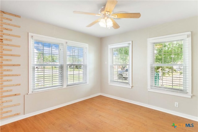 516 2nd St, Cuero, TX 77954 - empty room featuring light wood finished floors and ceiling fan