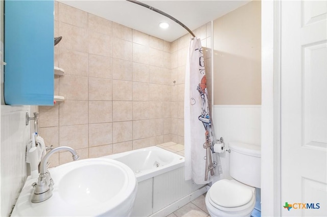 516 2nd St, Cuero, TX 77954 - full bath featuring shower / bathtub combination with curtain and tile patterned floors