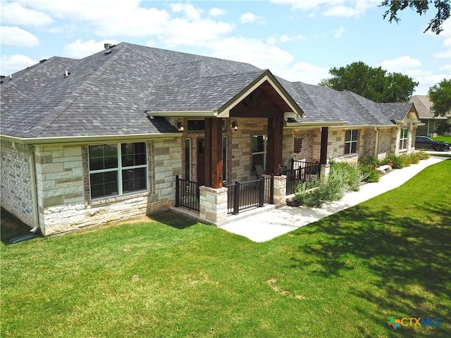 1026 County Road 3152, Kempner, TX 76539 - rear view of house with stone siding, a lawn, roof with shingles, and a porch