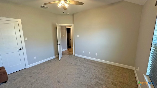 1026 County Road 3152, Kempner, TX 76539 - unfurnished bedroom featuring carpet floors, baseboards, and a ceiling fan
