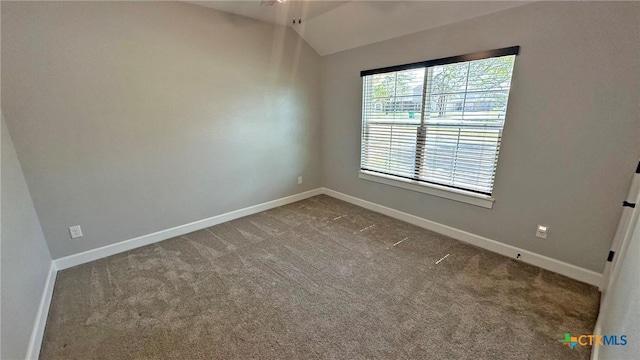 1026 County Road 3152, Kempner, TX 76539 - spare room featuring carpet, vaulted ceiling, baseboards, and a ceiling fan