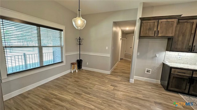 1026 County Road 3152, Kempner, TX 76539 - unfurnished dining area featuring light wood-style flooring and baseboards