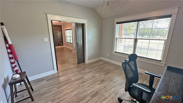 1026 County Road 3152, Kempner, TX 76539 - office area with baseboards, vaulted ceiling, and light wood-style flooring