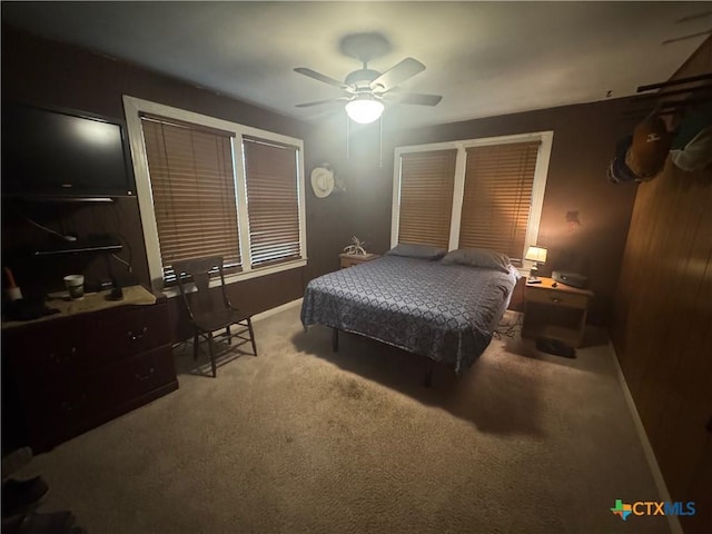 27 Wallace Ln, Victoria, TX 77904 - bedroom with carpet flooring, baseboards, and ceiling fan