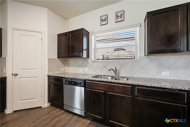 kitchen featuring light stone counters, dishwasher, dark hardwood / wood-style floors, backsplash, and dark brown cabinets