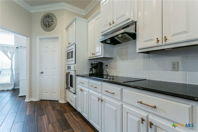 kitchen featuring white cabinets, stainless steel appliances, dark hardwood / wood-style floors, and crown molding