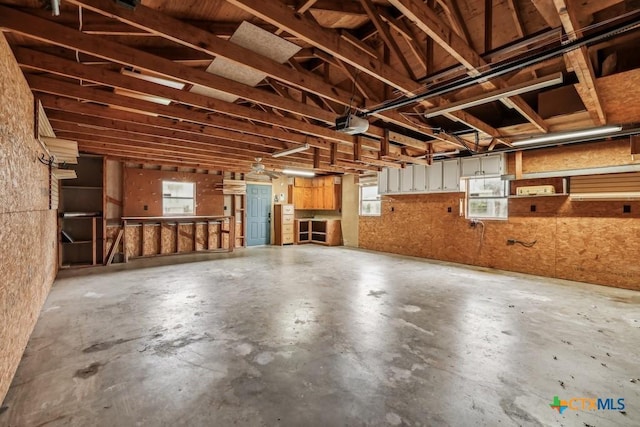 garage featuring a garage door opener