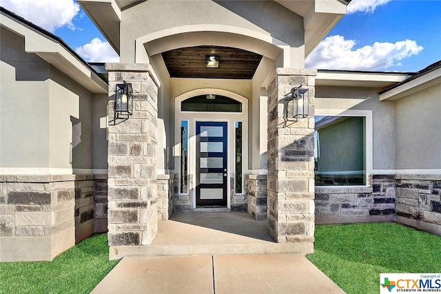 105 Hondo Rdg, La Vernia, TX 78121 - view of exterior entry featuring stone siding and stucco siding