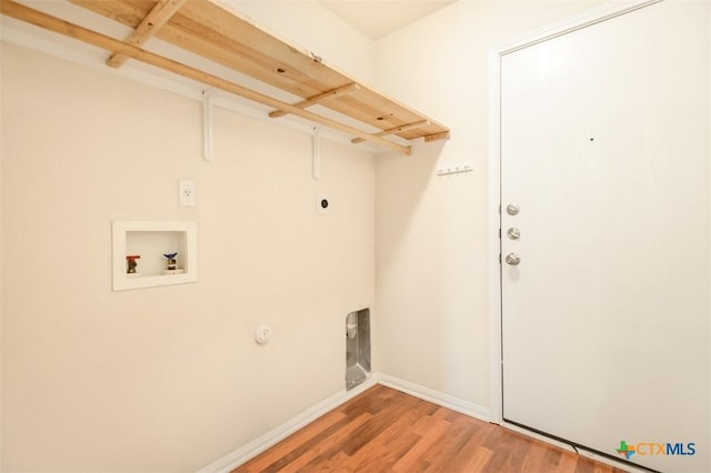 404 Chieftain Trl, Harker Heights, TX 76548 - laundry room with washer hookup, laundry area, electric dryer hookup, baseboards, and light wood-style flooring