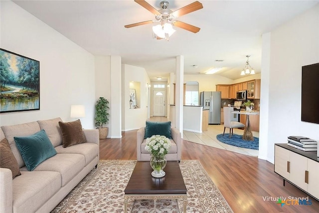 404 Chieftain Trl, Harker Heights, TX 76548 - living room with baseboards, a ceiling fan, and light wood finished floors
