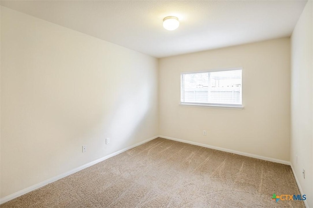 404 Chieftain Trl, Harker Heights, TX 76548 - unfurnished room with baseboards and carpet