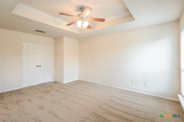 404 Chieftain Trl, Harker Heights, TX 76548 - unfurnished bedroom with visible vents, a raised ceiling, carpet floors, and a closet