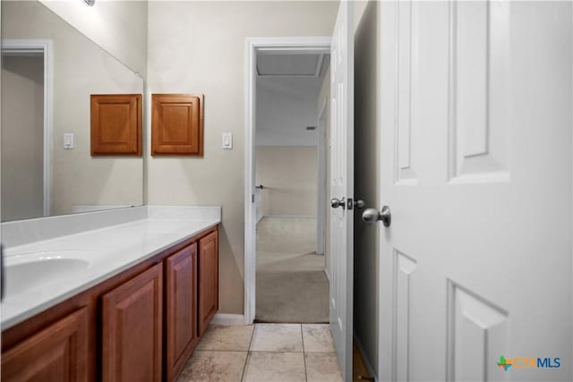 bathroom featuring tile patterned floors and vanity