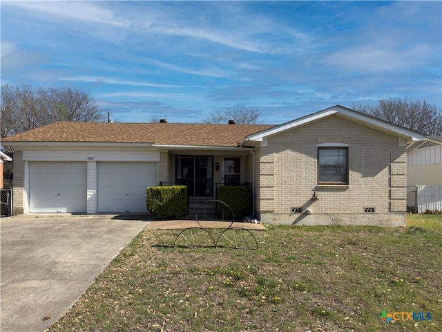 ranch-style home with a front lawn, a garage, brick siding, and driveway