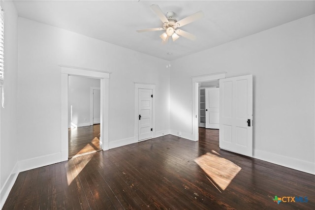 unfurnished bedroom with ceiling fan and dark hardwood / wood-style flooring