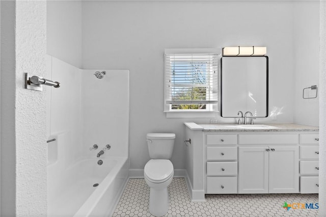 full bathroom with tile patterned flooring, shower / tub combination, vanity, and toilet