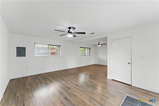 6022 Wildwind Dr, Windcrest, TX 78239 - empty room featuring wood finished floors, electric panel, ceiling fan, and baseboards