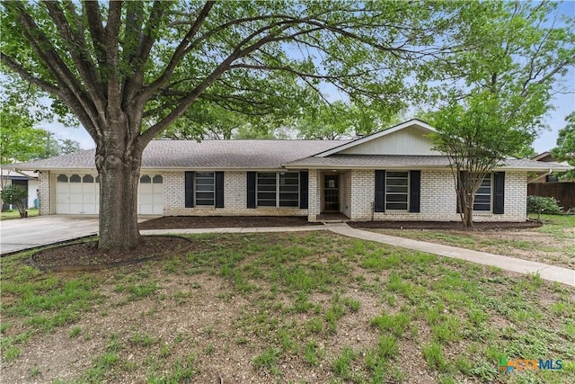 6022 Wildwind Dr, Windcrest, TX 78239 - single story home featuring an attached garage, brick siding, driveway, and fence