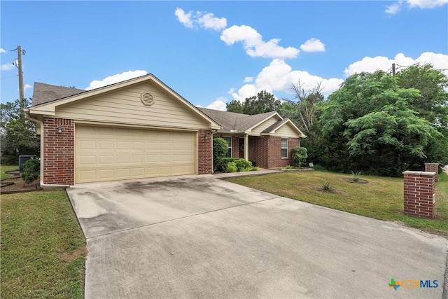 ranch-style house with a garage and a front yard