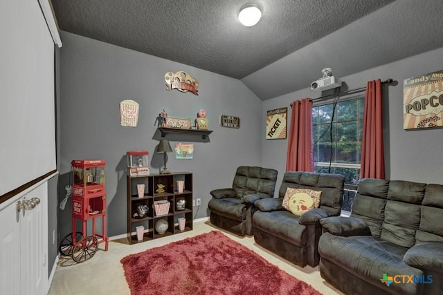 carpeted home theater with lofted ceiling and a textured ceiling