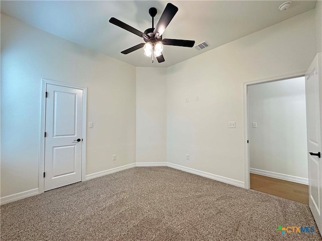 4316 Sunflower Ln, Temple, TX 76502 - carpeted empty room with a smoke detector and ceiling fan