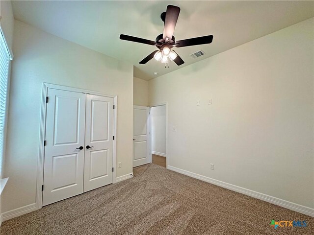 4316 Sunflower Ln, Temple, TX 76502 - unfurnished bedroom with carpet floors, a closet, and ceiling fan