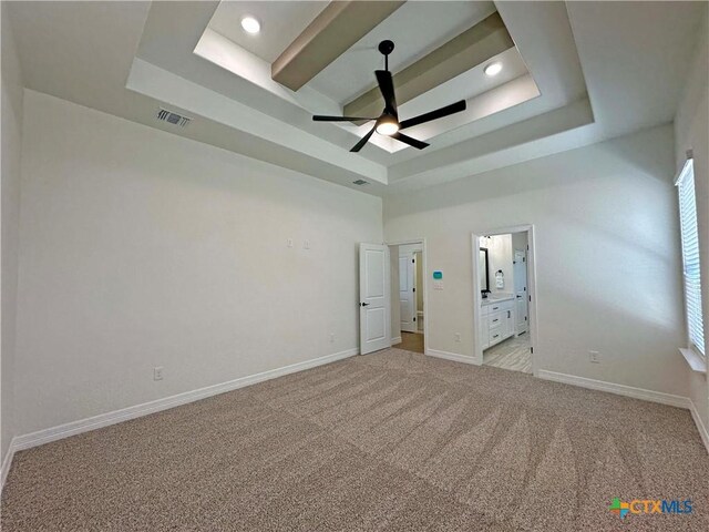 4316 Sunflower Ln, Temple, TX 76502 - carpeted empty room featuring a tray ceiling and a ceiling fan