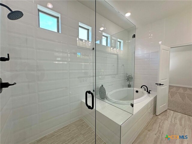 4316 Sunflower Ln, Temple, TX 76502 - full bathroom with a stall shower and a garden tub