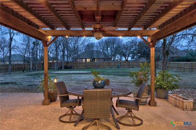 view of patio with outdoor dining space, a pergola, and a fenced backyard